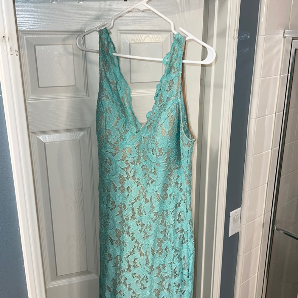 Beautiful Lace dress with attached skin tone under slip